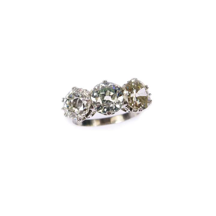 Three stone coloured and white diamond ring